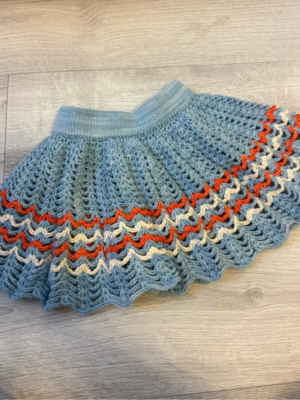 Misha Puff size 2y Light Blue Crochet Skirt with Orange and Cream Accents